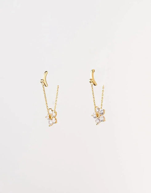 Gold pierced drop earrings with dainty chain and crystal flower pendants, elegant feminine style