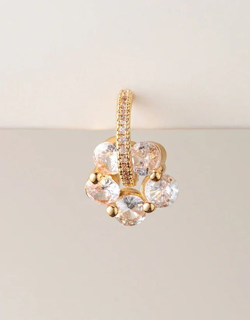 gold hoop earrings with clear round gemstones and pavé finish, elegant and modern style