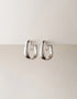 silver polished hoop earrings with organic, curved design, modern minimalist style