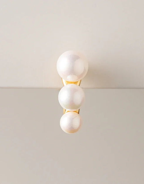 gold-tone drop earrings with three graduated white pearls, elegant and modern fashion jewelry