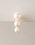 gold-tone drop earrings with three graduated white pearls, elegant and modern fashion jewelry
