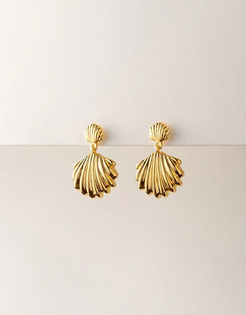 gold pierced drop earrings with shiny scallop shell design, polished finish, elegant beach style