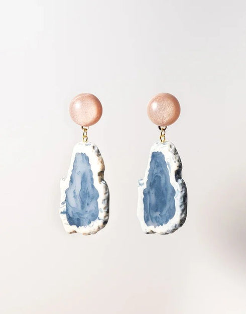 drop earrings with peach round studs and blue-white geode resin pendants, gold accents, boho style