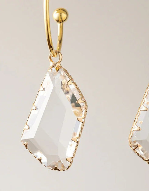 gold hoop earrings with faceted clear crystal drops in unique kite shape gold-plated elegant style
