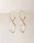 Gold-plated hoop earrings with clear faceted geometric crystal drops, elegant and modern style